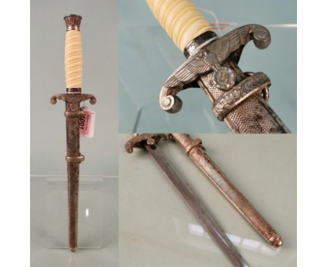 An Army (HEER) Officer's dress dagger, adopted 1935.  This example with white grip and set of correct hangers with clips mark