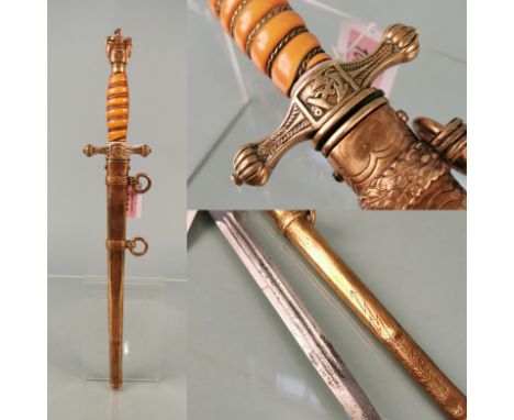 A second model Navy (Kriegsmarine) Officer's dress dagger, by W.K.C. This example is with orange grip and blade with some sta