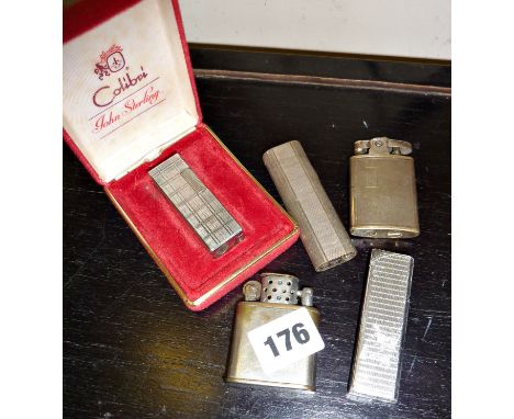 Vintage Colibri lighter in case, with four other lighters