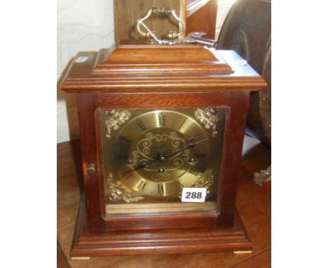 Metamec of England bracket-style chiming mantle clock in mahogany case with brass dial