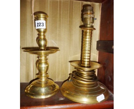 17th c. Dutch brass candlestick with drip tray, together with a later example (converted)