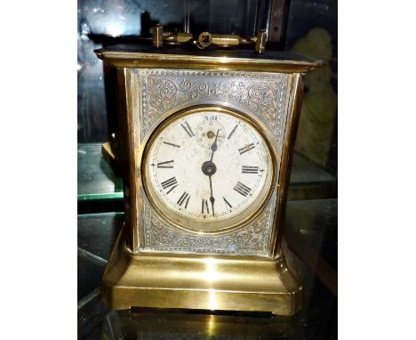 Junghans brass carriage alarm clock with musical alarm