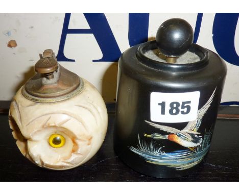 Bakelite flintless table lighter by Dorset Light Industries of Bridport, and a carved onyx owl table lighter