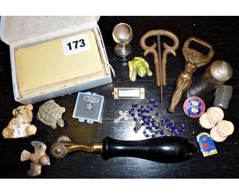 Box of assorted items including miniature CLUB harmonica, Butlin's badges, old Jews harp, a naked lady bottle opener, Wade Wh