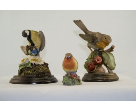 Royal Worcester Bird Figure ' Robin ' 2.75 Inches High + Two Country Artist Bird Figures by Richard Cooper, 5.25 Inches High.