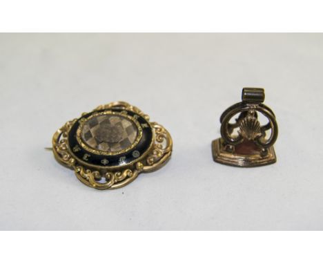 A 19th Century Gilt Metal and Enamel Mourning Brooch. 2 Inches High + a 19th Century Gilt Metal Seal / Wax. 1.25 Inches High.