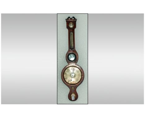 A Mahogany Wheel Barometer With Silvered Dial 'Hygrometer, Thermometer & Spirit Level' Mid 19th Century. 37.5'' in height.