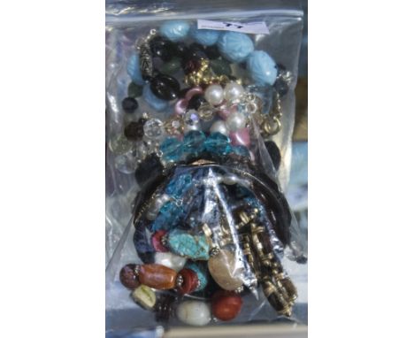 Bag of Costume Jewellery Bracelets, beaded, faux gem set and a bangle etc