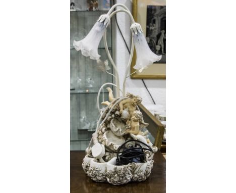 Resin Decorative Figural Fountain Table Lamp the base in the form of two cherubs above a fountain with dolphins swimming belo