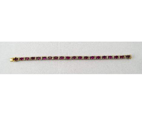 Silver Gilt Tennis Bracelet Set With 19 Ruby Red Coloured Stones Between Clear Faceted Spacers, Marked 925, Length 7½ Inches