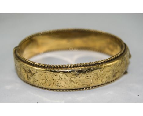 A Vintage 9ct Gold Hinged Bangle. Hallmark Chester 1959. 23.3 grams. 