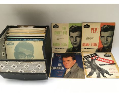 A record case of EPs by artists from the 1950s/60s including Buddy Holly, Little Richard, Elvis Presley, Fats Domino, Del Sha