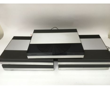 A set of Bang &amp; Olufsen hi fi equipment comprising a Beogram 5500 record player, Beogram 5500 CD player, two Beocord 5500