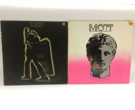 A first UK pressing of 'Mott' by Mott The Hoople and 'Electric Warrior' by T Rex.