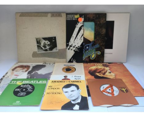A collection of various LPs a d 7inch singles by various artists including David Bowie, Buddy Guy and others plus a promo sin