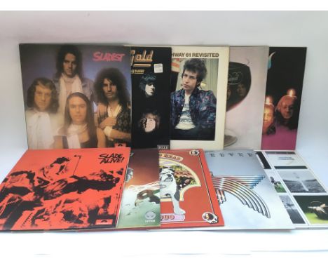 A collection in two bags of 18 rock and pop LPs. Y various artists including Deep Purple, Bob Dylan, Pink Floyd and others.