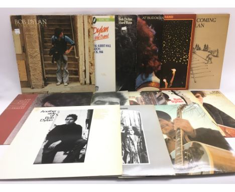 Fourteen Bob Dylan LPs comprising 'Blood On The Tracks', 'Freewheelin', 'Nashville Skyline' and others.