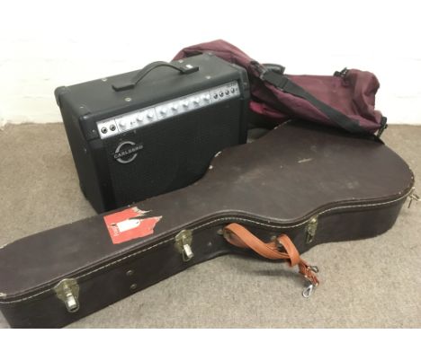 A Carlsbro GLX30 guitar amplifier, a hard shell guitar case and two gig bags (4).