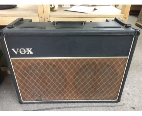 A circa 1970s Vox AC30 top boost guitar amplifier with original footswitch, serial number 16083.