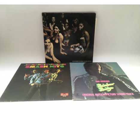 Three Jimi Hendrix LPs comprising 'Electric Ladyland', 'Rainbow Bridge' and 'Smash Hits'.