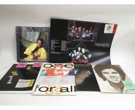 A collection of tour programs and tickets for various artists including The Bee Gees, George Benson, Luther Vandross and othe