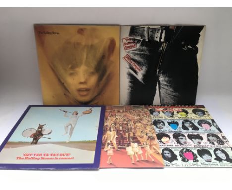 Five Rolling Stones LPs comprising 'Sticky Fingers' with zipper fly sleeve, 'Goat's Head Soup', 'Some Girls' and others.