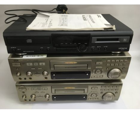 Two JVC XL-SV23 video CD players, Hitachi RMD100 CD and mini disc player and all remotes plus a ProCD disc holder etc.