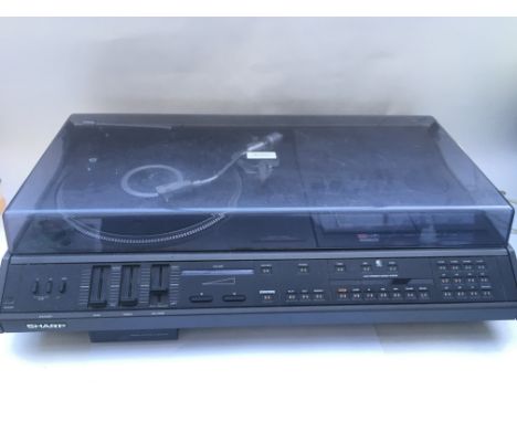 A vintage Sharp stereo music centre SG-500E.