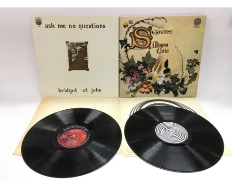 Two first UK pressings of folk rock LPs comprising 'Seasons' by Magna Carta 6360 003 and 'Ask Me No Questions' by Bridget St 
