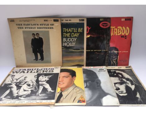 A collection of mainly rock n roll LPs by various artists including Buddy Holly, Eddie Cochran and others.