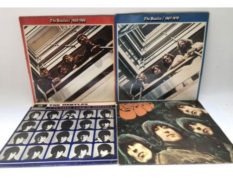 Four Beatles LPs comprising reissues of 'Rubber Soul', 'A Hard Day's Night' and others plus three Bob Dylan LPs.