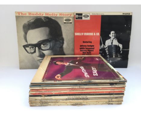 A collection of various LPs including Buddy Holly, Roxy Music and Frank Sinatra.