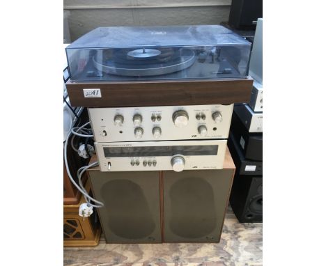 A vintage JVC JL A1 turntable, stereo amplifier JA S310, a stereo tuner JT V310 and a pair of speakers.