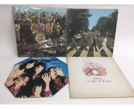 Four early issue LPs comprising The Beatles, The Rolling Stones and Queen including a Far East territories 'Abbey Road'.