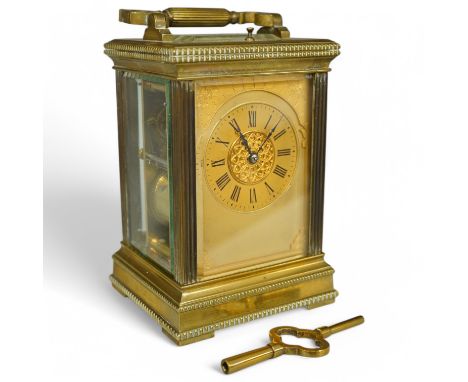 A French brass repeating carriage clock, engraved Paris to the backplate, 15cm high. Condition - good.