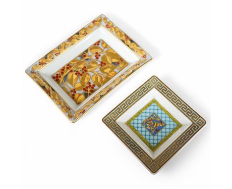 A Patek Philippe pin tray and another by Versace, largest 12cm. Condition - good