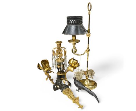 A bronze, ormolu and lustre candlestick, a bronze and ormolu cherub two branch sconce, a French brass student's lamp with bla