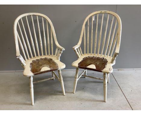 A pair of Laura Ashley painted Windsor comb back armchairs, width 59cm, depth 46cm, height 104cm. Condition - fair
