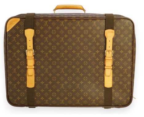 A Louis Vuitton suitcase 49cm high; 66cm long; 17cm depth.