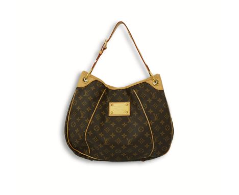 A Louis Vuitton brown monogram canvas with natural cowhide trim and gold-toned hardware, with original dust bag and box.
