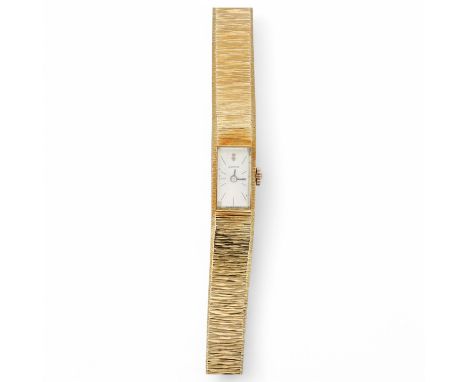A lady's 1960's 18ct gold manual wind bracelet watch, overall length 16.5cm, gross weight 37.1 grams. Condition - fair to goo