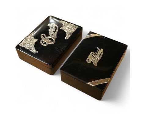 Two Edwardian/George V silver mounted ebonised playing card boxes, largest 16cm wide. Condition - fair/good