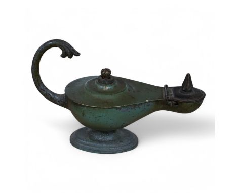 A vintage Dunhill patinated brass ‘oil lamp’ table lighter, 15cm long. Condition - worn, not tested