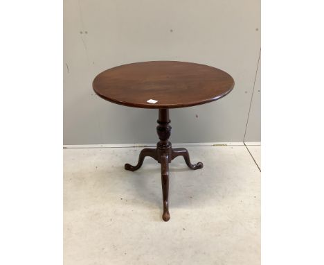 A George III mahogany circular tilt top tripod tea table, diameter 73cm, height 72cm. Condition - fair