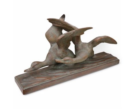 A terracotta bronze effect mallard duck group, stamped on base  R Pollin. 72cm long. Condition - good