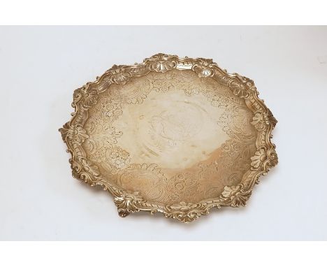 A late George II provincial shaped circular silver salver, by William Partis, Newcastle 1754?, with engraved crest and later 