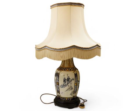 A Chinese decorated warrior porcelain vase, converted to a table lamp with cream shade, 89cm high including shade. Condition 