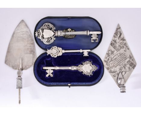 A George V Silver Presentation Key and Two Others, the George V by Haseler Brothers, Birmingham 1915, with presentation engra