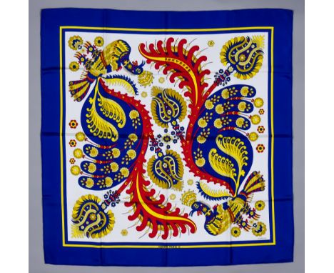A Hermes Silk Scarf - "Skyros", designed by Julia Abadie (1971) - in blue, yellow, and red twill, 35ins square, with original