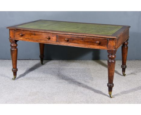 A Victorian Partners Mahogany Writing Table, with green leather inset to top, fitted two frieze drawers to each side, on turn